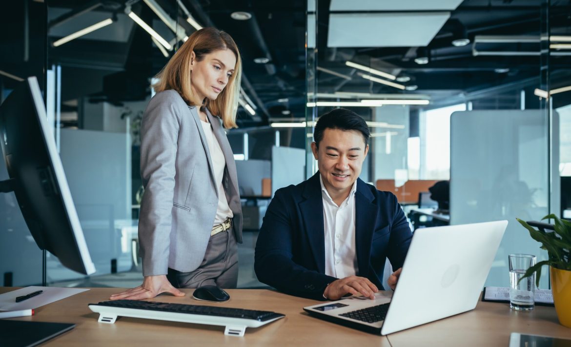 Happy,Coworkers,Discuss,Project,Strategy,By,Looking,And,Pointing,At